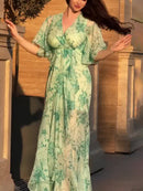 Vestido de manga de trompete de decote em V retro