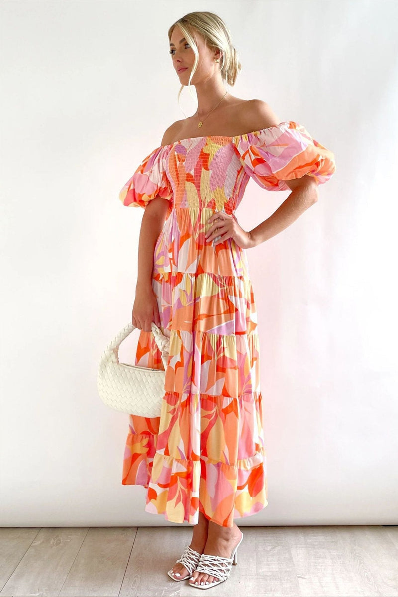 Vestido maxi estampado Andrea com ombros de fora e manga bufante em camadas