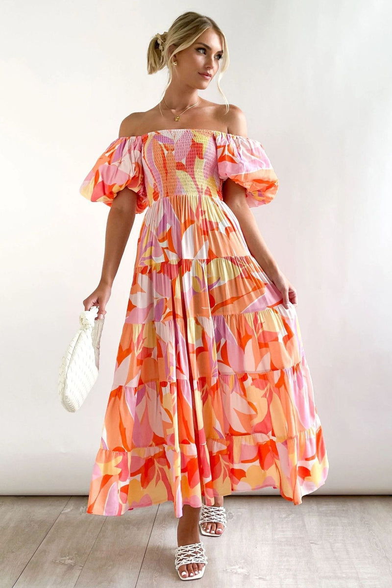 Vestido maxi estampado Andrea com ombros de fora e manga bufante em camadas